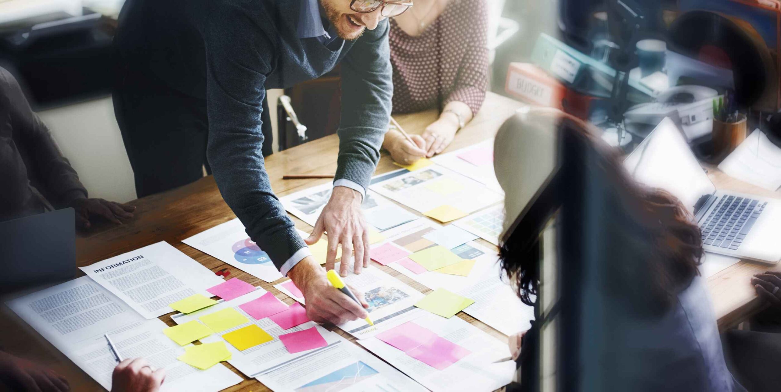 Group of professionals brainstorming at a table