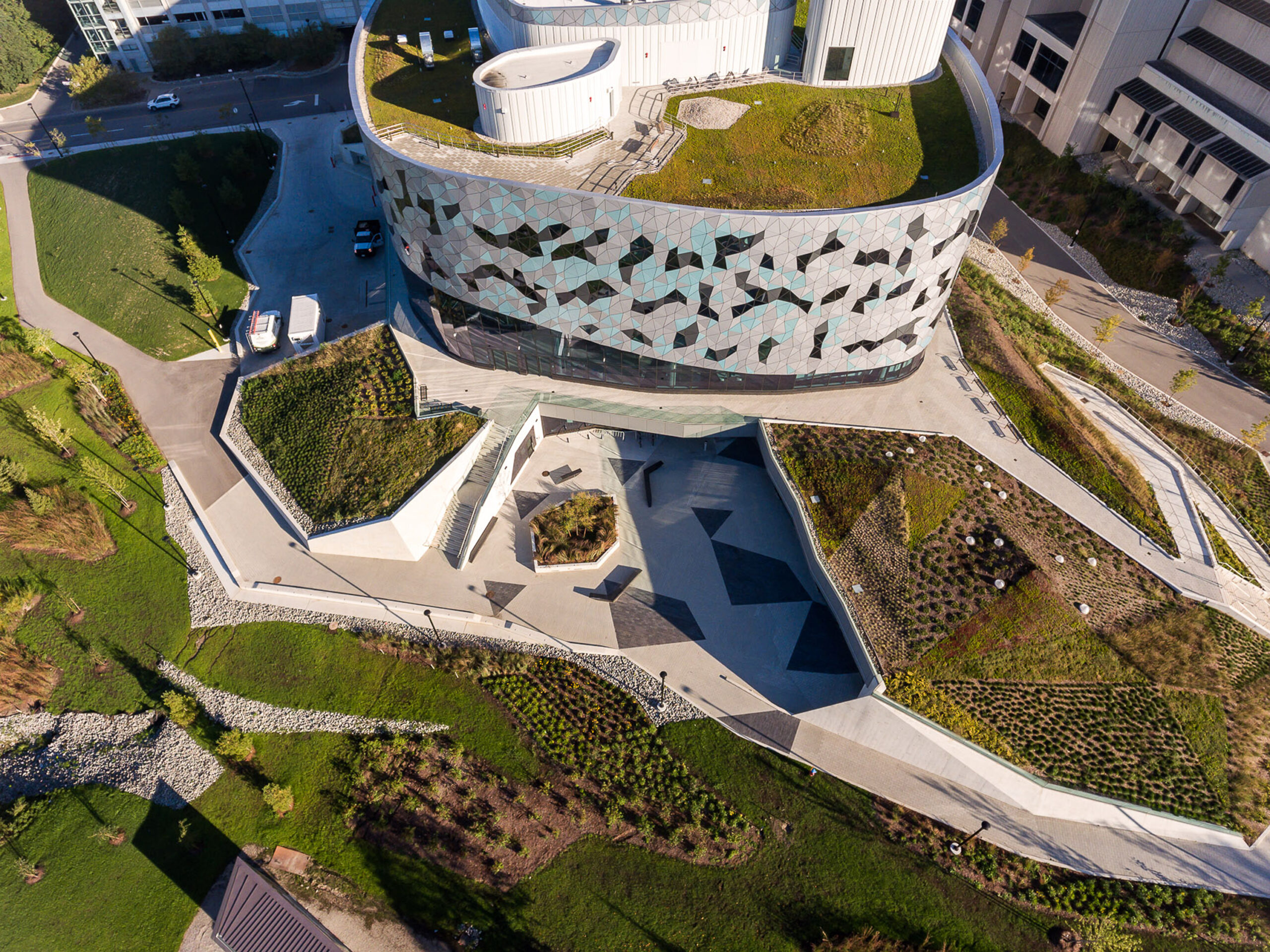 Lassonde Bergeron Centre, bird eye view, aerial shot, sunny day, green rooftop and landscape