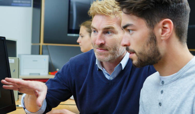 Professor helping a student