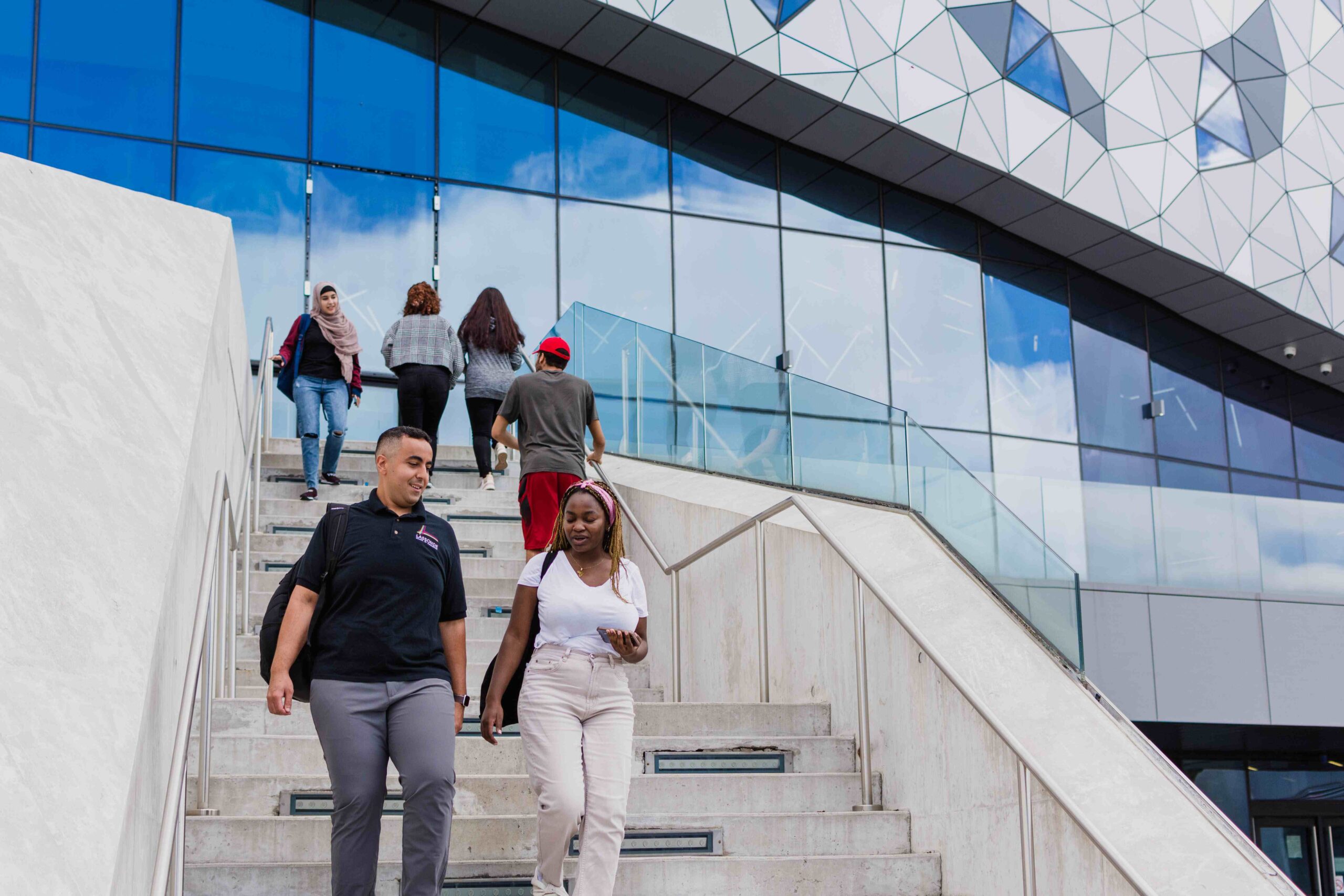 Lassonde students walking on the stairs outside of Bergeron Centre