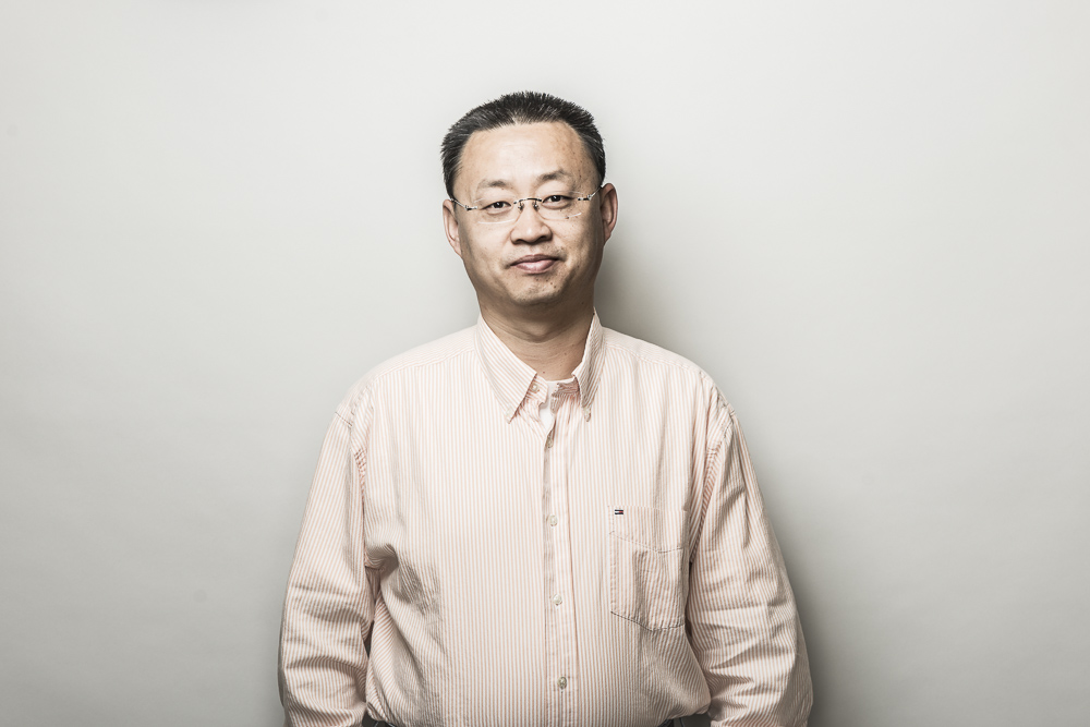 Headshot of Professor Jinjun Shan