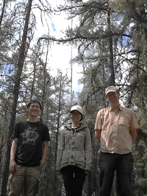 Kaiti (Timothy) Jiang , Xuanyi Zhang and Professor Gordon standing in front of the tower.