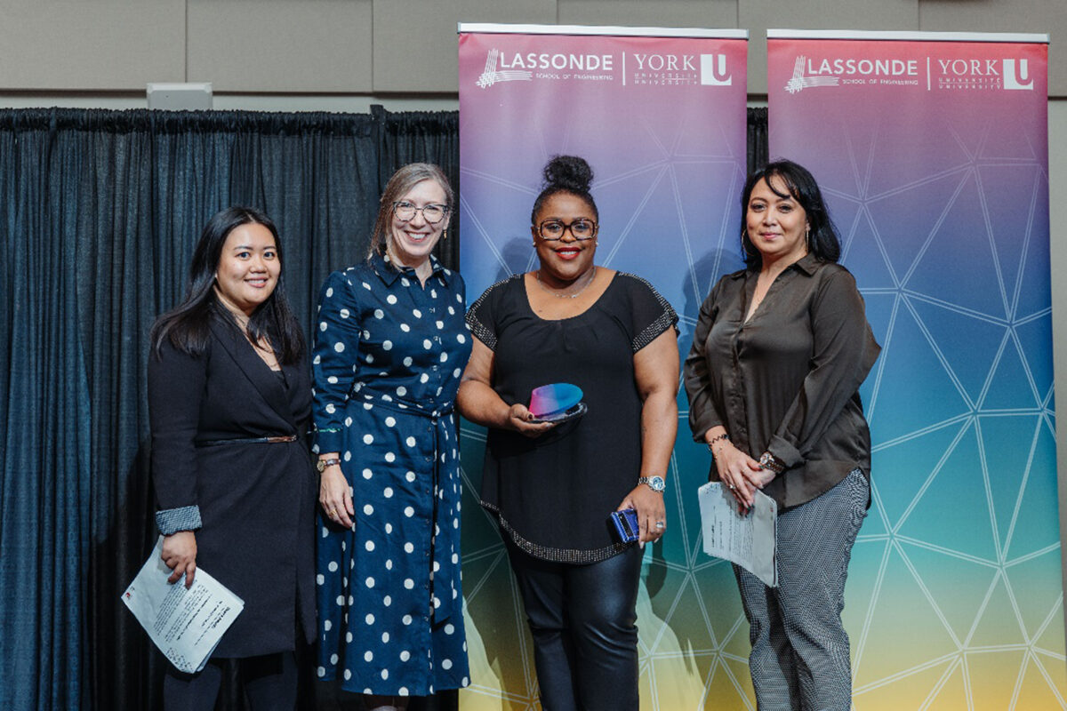 2022 Lassonde Awards Ceremony, CIBC representatives, Shalise Goffe and Rowena Bano accepting their Co-op Employer of the Year award from Dean Jane Goodyer and Mayolyn Dagsi