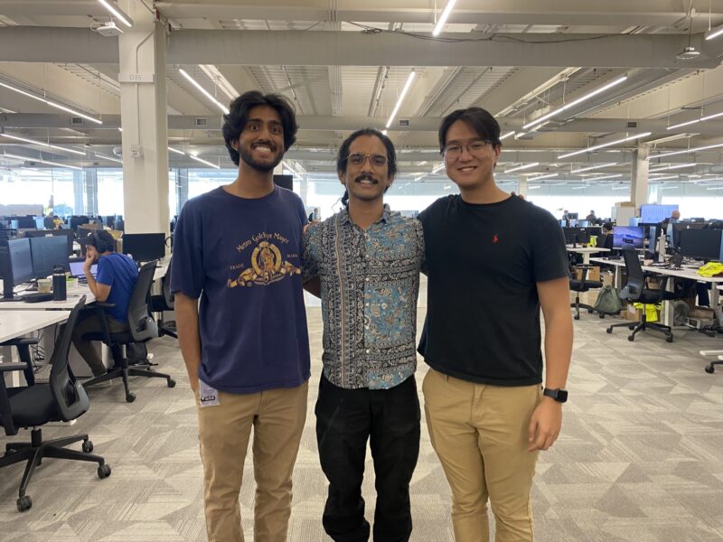 Brandon Loy (center) and his interns at Tesla headquarters