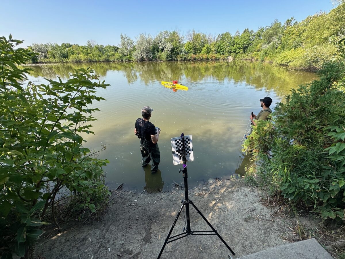 Professor Michael Jenkin and his student conducting outdoor research.