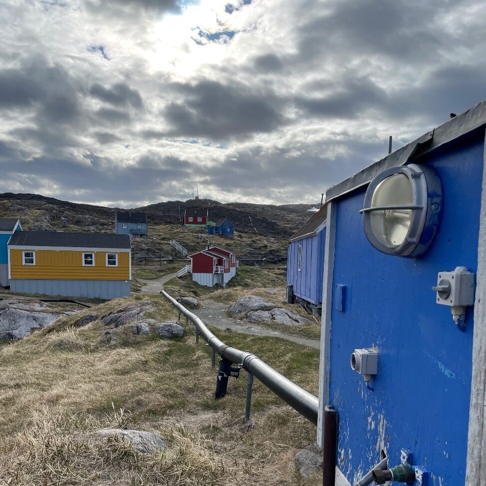 pipes leading to a Tap House in the remote settlement of Itilleq, Greenland