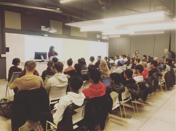 Karen Lai hosting a lecture