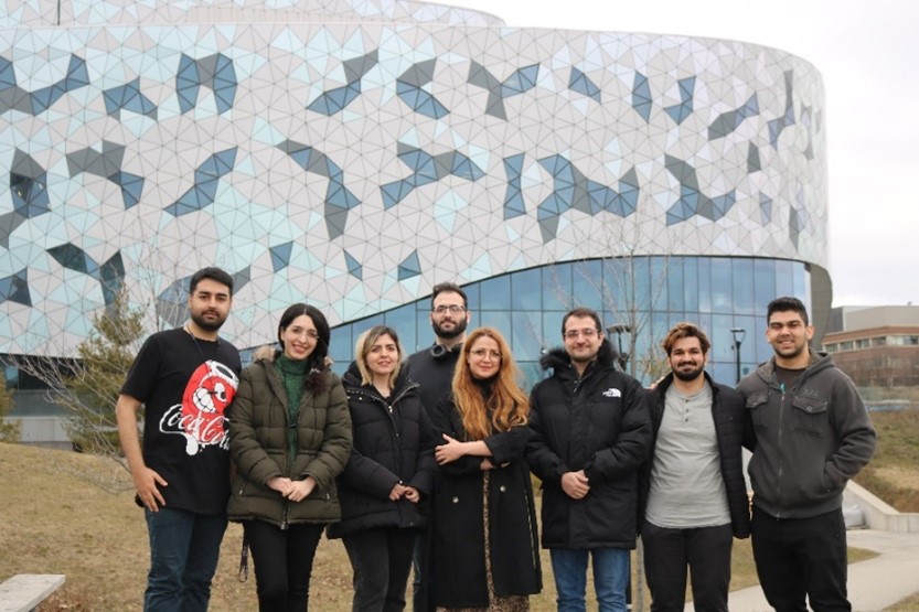 Professor Neda Salahandish (center) and student researchers in front of the Bergeron Centre for Engineering Excellence.