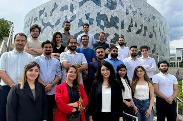 Professor Neda Salahandish and her students standing in front of the Bergeron Centre for Engineering Excellence