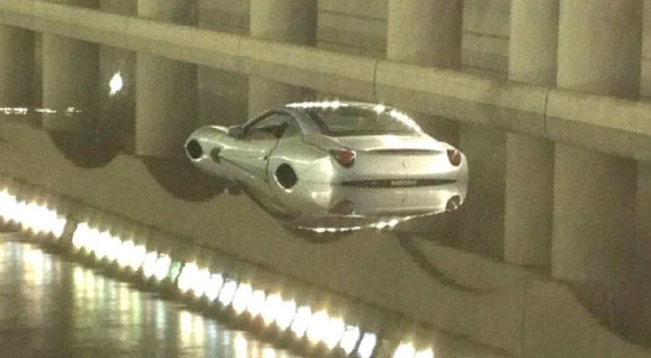 An abandoned Ferrari on Lower Simcoe during the July 2013 Toronto Flood. 