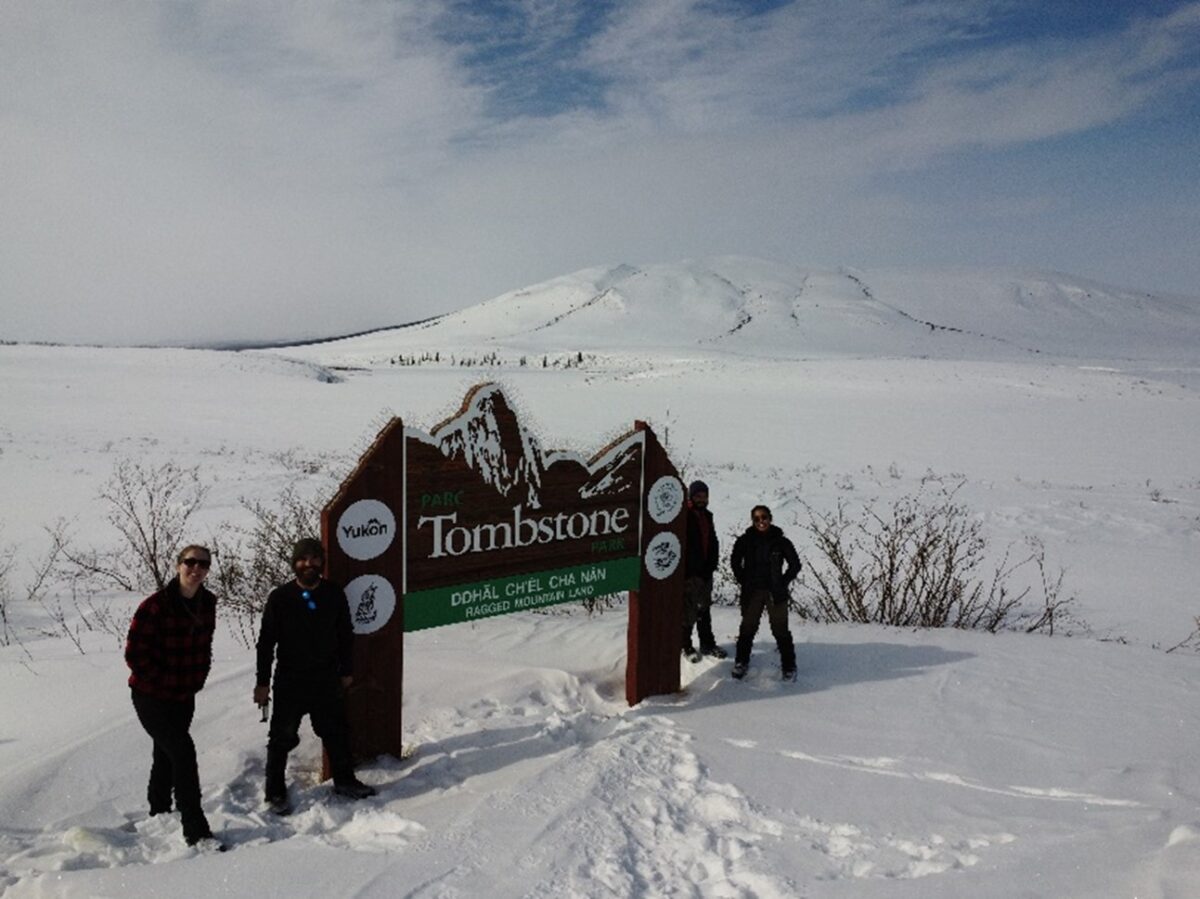 Professor Isaac Smith and three York University graduate students at the entrance of Tombstone Territorial Park in the Yukon. Left to right: Abi Lee, Isaac Smith, Ivan Mishev and Chimira Andres