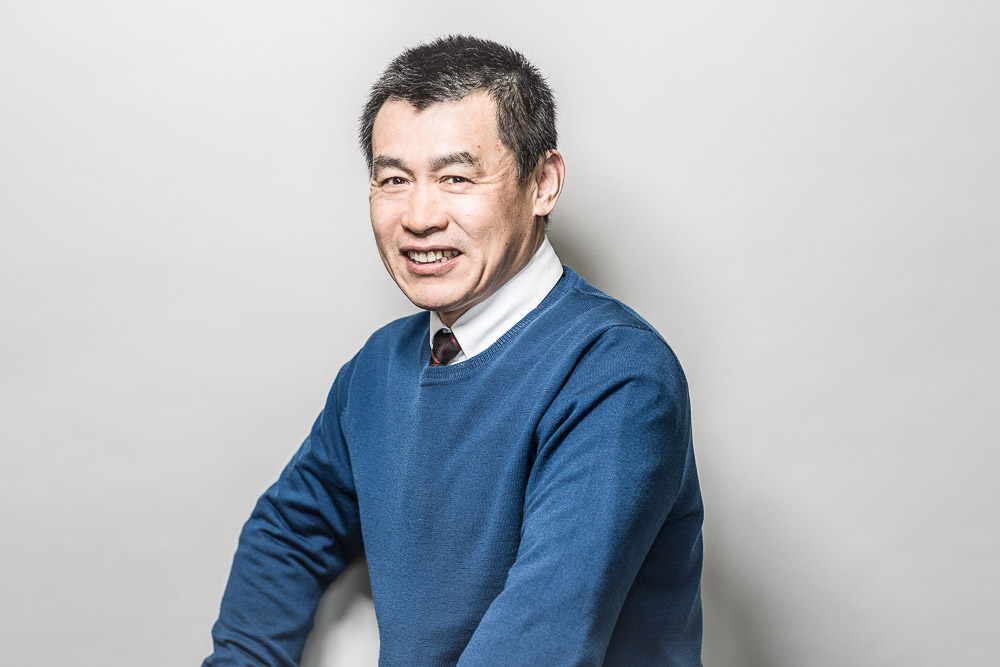 Headshot of Jian-Guo Wang