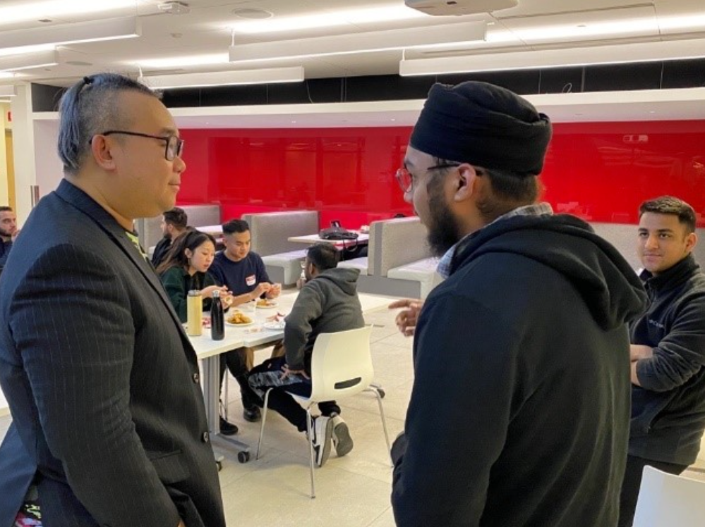 Keith Loo speaks to students after the Mercier Seminar