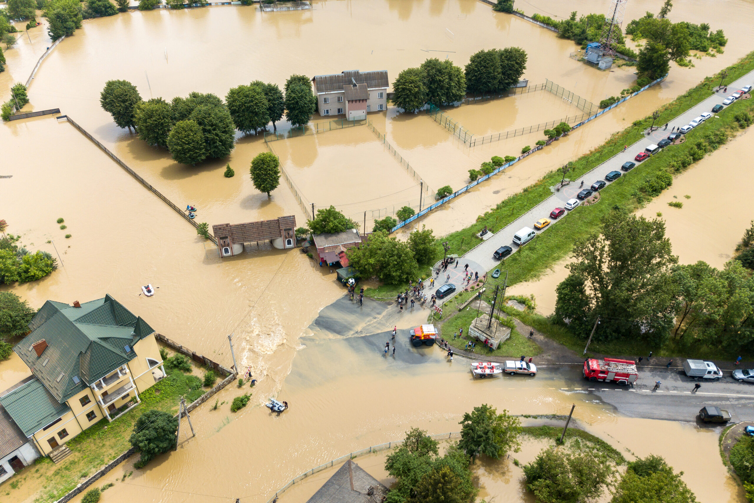 Aerial view of flooded houses and rescue vehicles saving people in Halych town, western Ukraine.