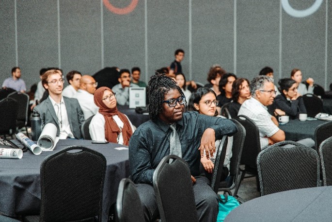 LURA conference attendees watching presentations