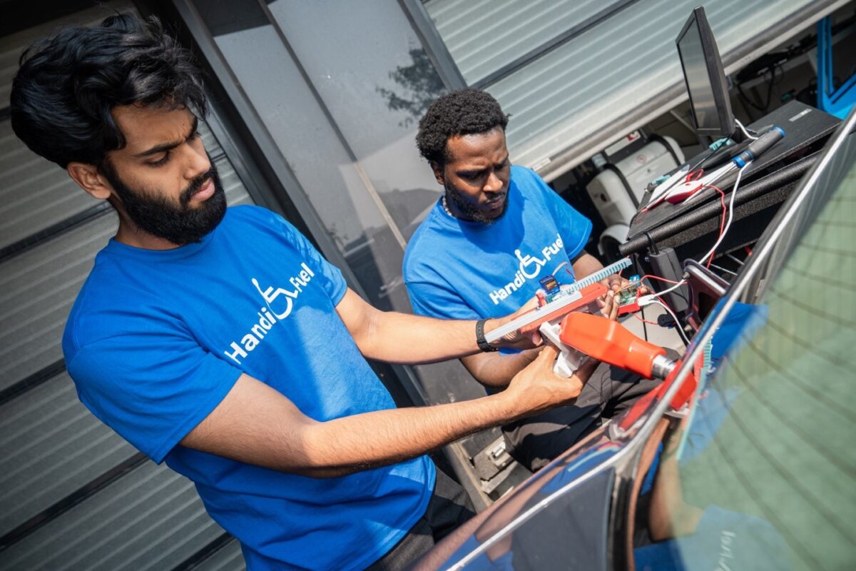 Handi-Fuel group members working on their prototype