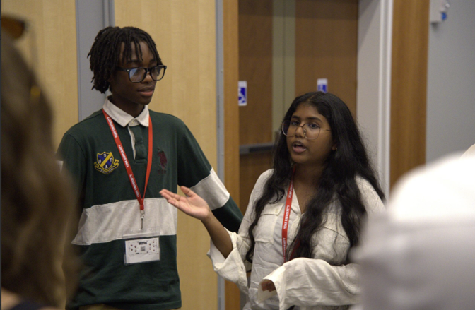 Students presenting their work at the Bringing STEM to Life symposium.