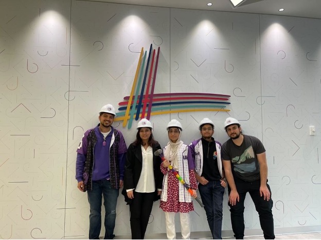 Lassonde Engineering Society members wearing hard hats during engineering week celebrations