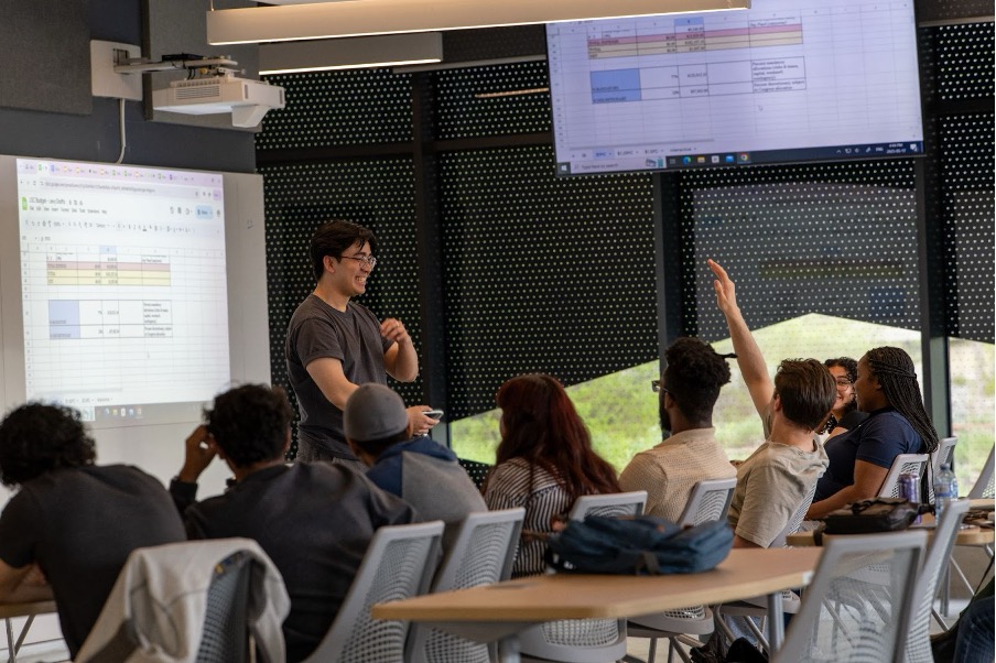 Lassonde Student Congress member presenting to engaged student audience