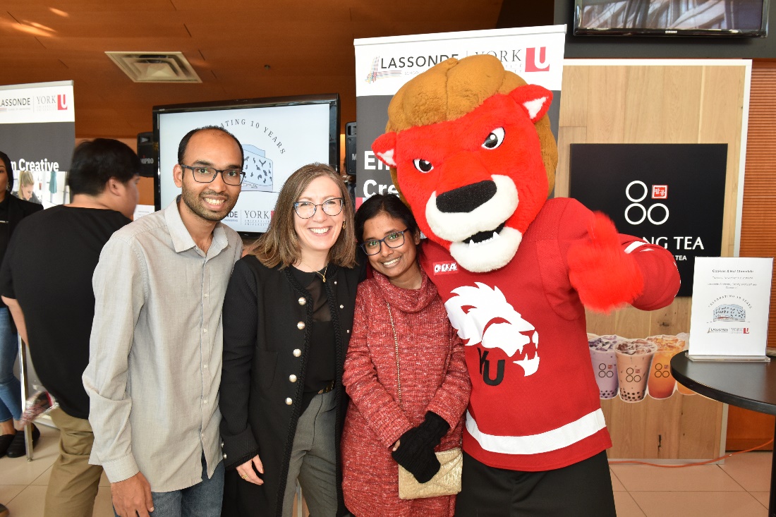 November 1, 2022, Lassonde 10th anniversary, Dean Jane Goodyer posing with students and Yeo the lion