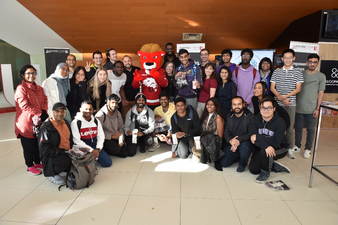 November 1, 2022, Lassonde 10th anniversary, Lassonde community members posing with Yeo the lion