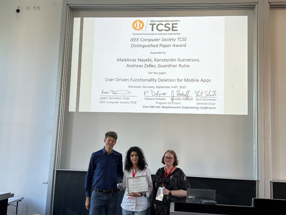 Professor Maleknaz Nayebi (middle) with Dr. Fabiano Dalpiaz (left) and Dr. Jennifer Horkoff (right) at the 31st IEEE International Requirements Engineering 2023 Conference.