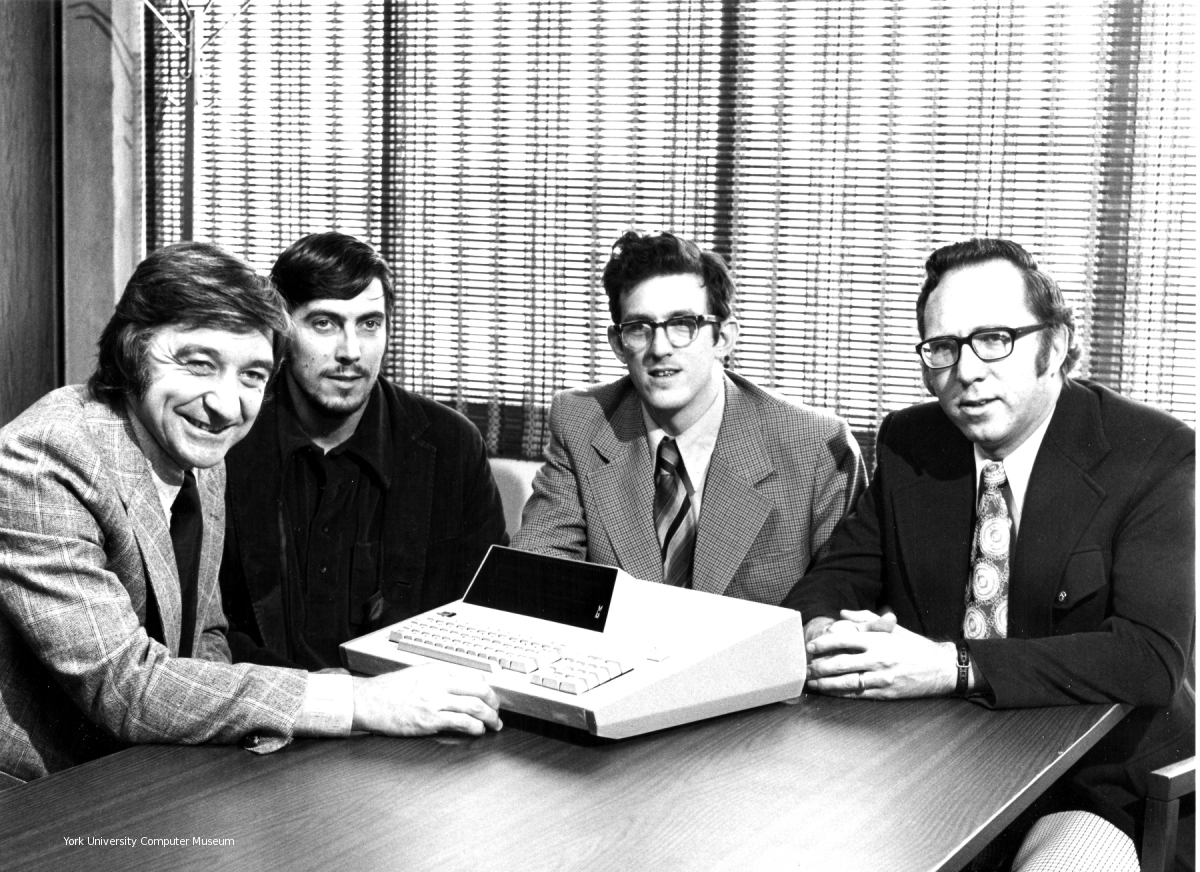 Mers Kutt, Gordon Ramer, Edward (Ted) Edwards and Reg Rea with a prototype of the MCM/70