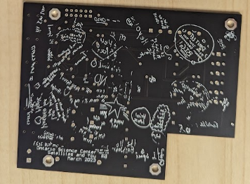 Messages collected from youth during ‘Satellites and You’ presentations, etched onto printed circuit board (PCB) of RSOnar v2.