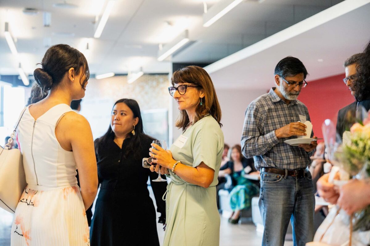 Guests connecting over drinks in the Bergeron Centre Eatery. 