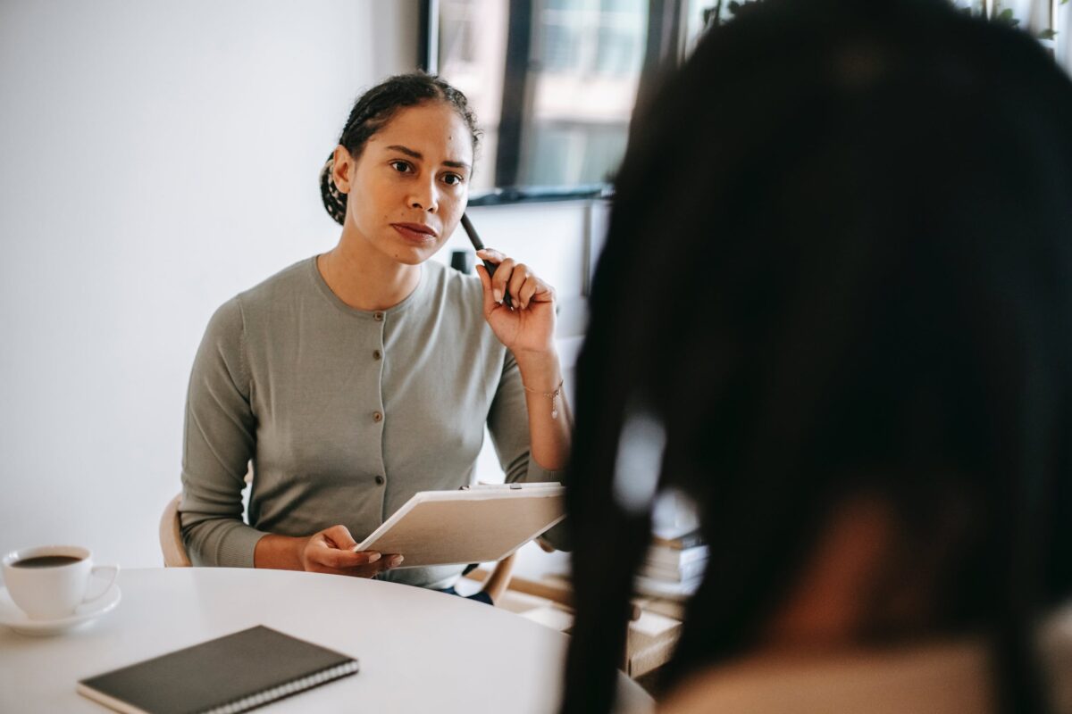 Counsellor listens to client