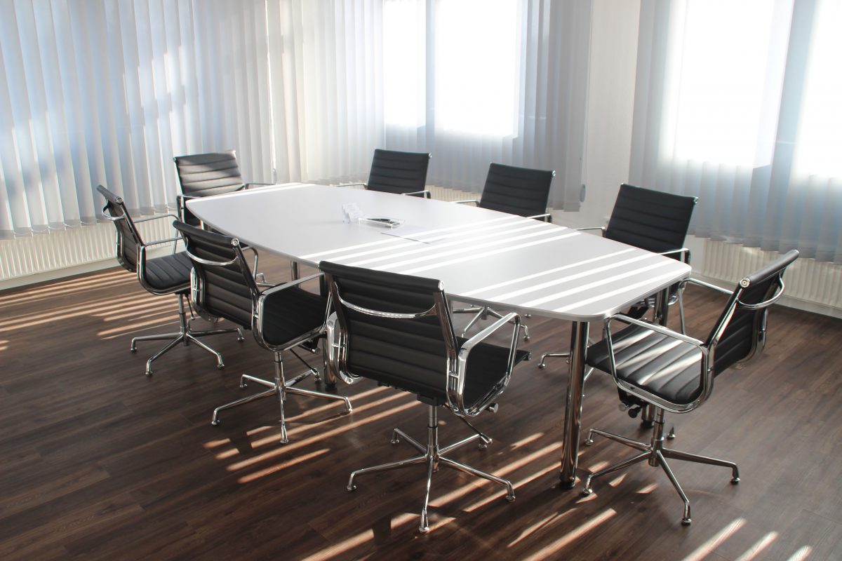 Image of a table with empty chairs