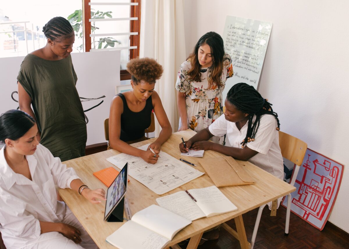 Students sitting around table