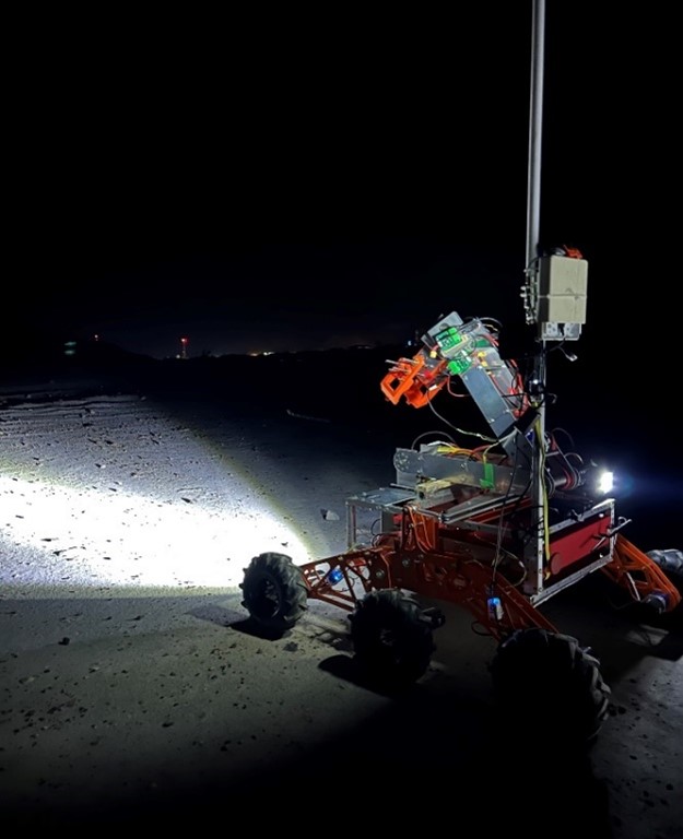 Redesigned rover during 2023 Canadian International Rover Challenge night task: search and rescue.